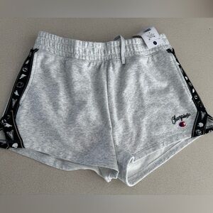 Champion women’s standard ash heather shorts motif taping, size Medium.